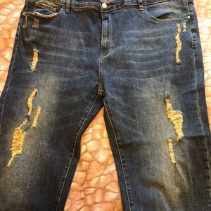 Distressed boyfriend denim jeans